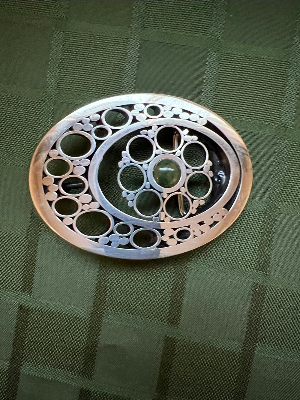 Silver Tone Oval Belt Buckle with Cutout Circles and Central Green stone - Picture 7 of 8
